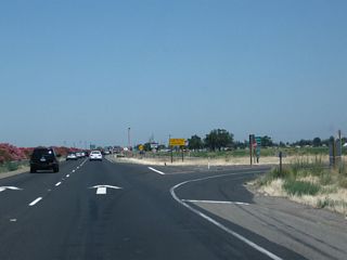 There is no deceleration lane for the "off-ramp" to Kingsley Road (the frontage road, which really is a hard, 90-degree right turn).
