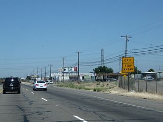 Exiting traffic will have to stop upon leaving the freeway.