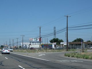 Clark Drive travels east from the interchange and connects to the 99 Frontage Road on the east side of the freeway.