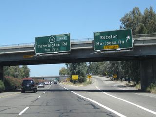 Northbound California 99 meets Exit 252A, California 99 Business (Mariposa Road) north and San Joaquin County Route J-7 (Mariposa Road) south. J-7 is a long county route that extends from Stockton southeast to California 59 near Merced. The next exit along California 99 north is Exit 252B, California 4 (Farmington Road) east and California 4 Business (Farmington Road) west.