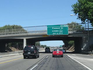 The next exit along California 99 north is Exit 254A, California 4 (Crosstown Freeway) west, followed by Exit 254B, California 26 (Fremont Street) east to Linden, Valley Springs, and Mokelumne Hill.