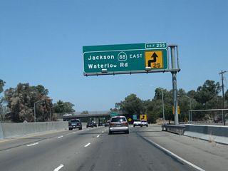 Northbound California 99 meets Exit 255, California 88 (Waterloo Road) east. California 88 leads northeast along an all-weather road across the Sierra Nevada, culminating at U.S. 395 in Minden, Nevada.