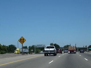 Traffic from California 99 Business (Wilson Way) merges onto California 99 from the left.