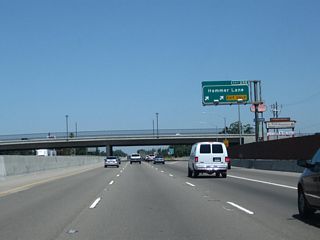 Northbound California 99 meets Exit 258, San Joaquin County Route J-8 (Hammer Lane). J-8 travels west to Interstate 5 Exit 478. This interchange was reconstructed in the late 2000s.