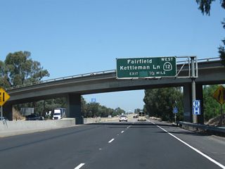 The next exit along California 99 north is Exit 264B, California 12 (Kettleman Lane) west in Lodi. California 12 leads west into the California Delta region, connecting with Interstate 80 in Fairfield, then turning northwest into the southern end of Napa Valley before entering the comparably well-regarded Sonoma Valley. After passing through Santa Rosa, California 12 culminates its westbound journey at California 116 in Sebastopol.