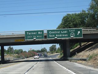 After their brief overlap, California 99 north and California 12 east part ways at Exit 266, California 12 (Victor Road) east and Victor Road west (use Victor Road west to California 99 Business (Cherokee Lane) in Lodi). The next exit along California 99 north is Exit 267A, Turner Road.