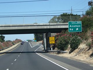 Northbound California 99 meets Exit 269, Acampo Road. To the west, Acampo Road travels into Acampo and meets San Joaquin County Route J-10 (Sacramento Road) east of there. To the east, Acampo Road connects with San Joaquin County Route J-5 (Elliott Road) near the banks of the Mokelumne River.