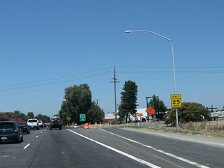 Northbound California 99 meets Exit 275A, Simmerhorn Road east to Cherokee Gardens and Simmerhorn Road west to Sacramento County J-10 (Lincoln Way) south and Elm Avenue west. As the name implies, Lincoln Way is an old alignment of the Lincoln Highway and U.S. 50-99.