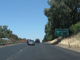 Northbound California 99 meets Exit 274B, Ayers Lane.