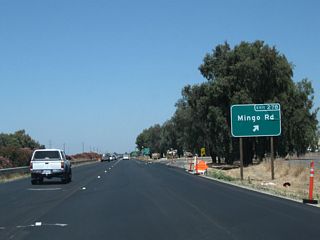 Northbound California 99 meets Exit 278, Mingo Road.