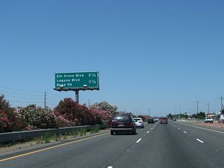The next two exits along California 99 north are Exit 286, Sacramento County Route E-12 (Elk Grove Boulevard) and Exit 287, Bond Road and Laguna Boulevard.