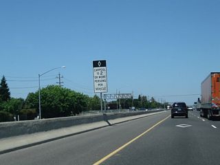 Entering the Sacramento metropolitan area, California 99 gains a high occupancy vehicle/carpool lane.