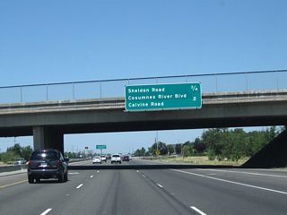 This mileage sign along northbound California 99 provides the distance to Exit 288, Sheldon Road (0.75 mile) and Exit 289, Consumnes River Boulevard and Calvine Road (two miles).