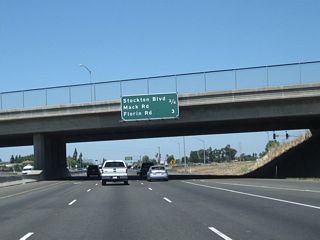 This mileage sign along northbound California 99 provides the distance to the next three exits: Exit 291, Stockton Boulevard north to Mack Road and Elsie Road and Exit 293A-B, Florin Road east and west.