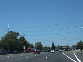 Another set of power lines pass overhead as we go through the 47th Avenue interchange.