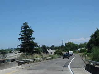 This view looks east along the ramp from California 99 north to U.S. 50 (El Dorado Freeway) east to Placerville and South Lake Tahoe.