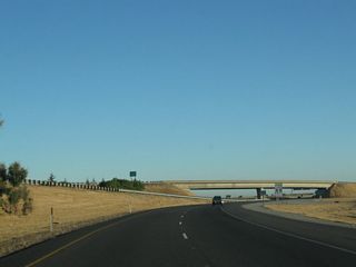 A flyover ramp carries traffic from Interstate 5 south to California 99 north.