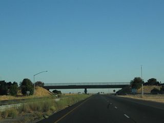California 99 passes through the Elkhorn Boulevard interchange. After this interchange, California 99 will revert to an expressway configuration.