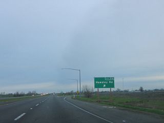 Northbound California 99 meets Exit 316, Howsley Road.
