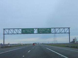 The next exit along California 99 north is Exit 319, California 70 north to Marysville and Oroville. At one time, California 70 and California 99 were cosigned between Interstate 5 and the upcoming split at Exit 319, but the California 70 signs were removed or covered in the late 1990s.