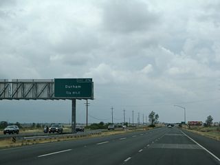 The next exit along California 99 north is Exit 376, Durham-Dayton Highway west to Durham and Durham-Pentz Road east to Butte College and Pentz (0.75 mile).