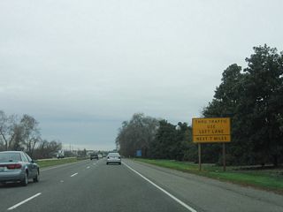 As the freeway resumes to bypass Chico, through traffic should use the left lane.