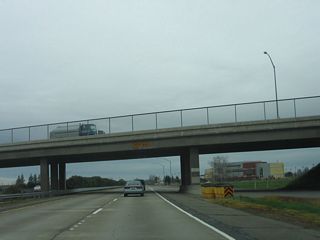The interchange with East Park Avenue and Skyway Drive used to a be full cloverleaf, but it has been reconfigured into a partial cloverleaf since then.