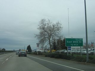 The next exit along California 99 north is Exit 384, East 20th Street (one-half mile).