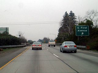 Returning to the mainline freeway, northbound California 99 meets Exit 386, East First Avenue in Chico.