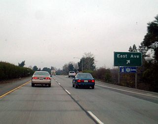 Northbound California 99 meets Exit 387B, East Avenue.