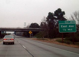 The next exit along California 99 north is Exit 387B, East Avenue, one-half mile.
