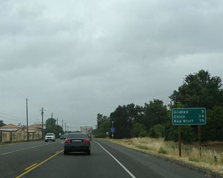 Leaving Live Oak, this mileage sign along California 99 north provides the distance to Gridley (five miles), Chico (34 miles), and Red Bluff  (75 miles).