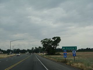 Northbound California 99 approaches Tehama County Route A-9 (South Avenue) west to Corning and Interstate 5.