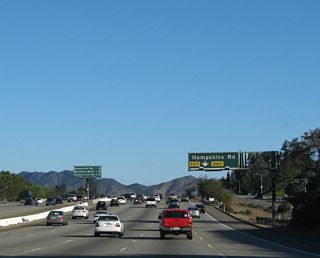 A lane drop occurs along U.S. 101/SR 23 (Ventura Freeway) south at Exit 41 for Hampshire Road.