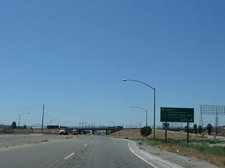 Heading west from SR 103, SR 1 (Pacific Coast Highway) northbound crosses the Wilmington and Harbor City neighborhoods of Los Angeles before turning northward through the city of Torrance. The PCH crosses over the Terminal Island Freeway via a 1948 bridge.