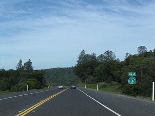 This is the first westbound reassurance shield for California 108 after leaving the intersection with Peaceful Oak Road (Standard Road). When new westbound lanes are built on a separate carriageway, the current roadway will become the eastbound lanes.