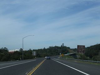 The next exit along California 108 (Sonora Bypass) west is the interchange with California 108 Business (Mono Way) west to downtown Sonora (0.50 mile). To California 49 north en route to Columbia and Angels Camp, use the California 108 Business off-ramp.