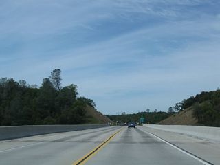 Along with the rest of the eastern segment of the bypass, the bridge over Sullivan Creek was built and opened to traffic in 2004.