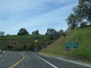 Westbound California 108 (Sonora Bypass) approaches Lime Kiln Road  and Washington Street  to downtown Sonora.