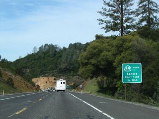 Westbound California 108 (Sonora Bypass) approaches its final interchange: California 49/West Stockton Street north and California 108 Business east to downtown Sonora. This interchange marks the western terminus of California 108 Business.