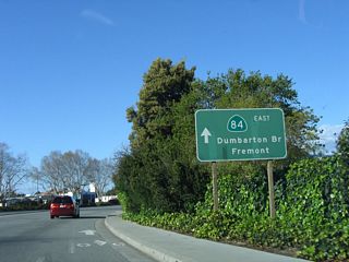 California 114 is signed as to California 84 and the Dumbarton Bridge. No standalone reassurance shields or trailblazers for California 114 exist.