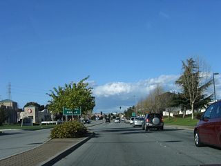 Northbound California 114 (Willow Road) approaches Hamilton Avenue.