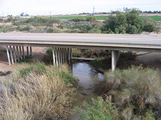 This view of the Alamo River Bridge is looking south from the defunct Interurban Railway bridge.