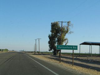 The next major intersection along southbound California 115 is with Imperial County S-26, Rutherford Road. This highway travels west to California 111 and east to Imperial County Route S-32.
