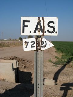 A porcelain-enamel F.A.S. (Federal Aid Secondary) marker is posted at the intersection of California 78-115 and Casey Road.