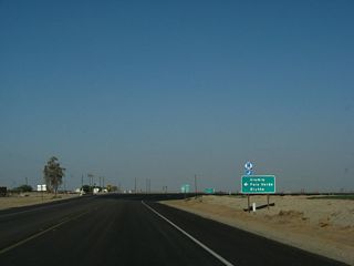California 78 and California 115 split soon thereafter. California 78 will turn left (east) toward Glamis and Blythe. Prior its designation as a state highway, California 78 was briefly known as Imperial County S-78. Bear right here for California 115 south to Holtville.