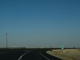 California 78 departs to the left/east, while California 115 proceeds right/south to Holtville.