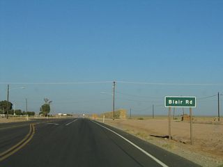 Southbound (eastbound) California 115 approaches Blair Road.
