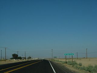 Southbound California 115 approaches Blair Road.
