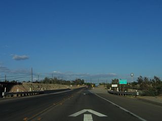 At the Alamo River crossing, California 115 and old U.S. 80 enter the city of Holtville. Incorporated in 1908, Holtville was named after its founder, W.F. Holt and is located about 16 feet below sea level, much like other Imperial Valley cities.